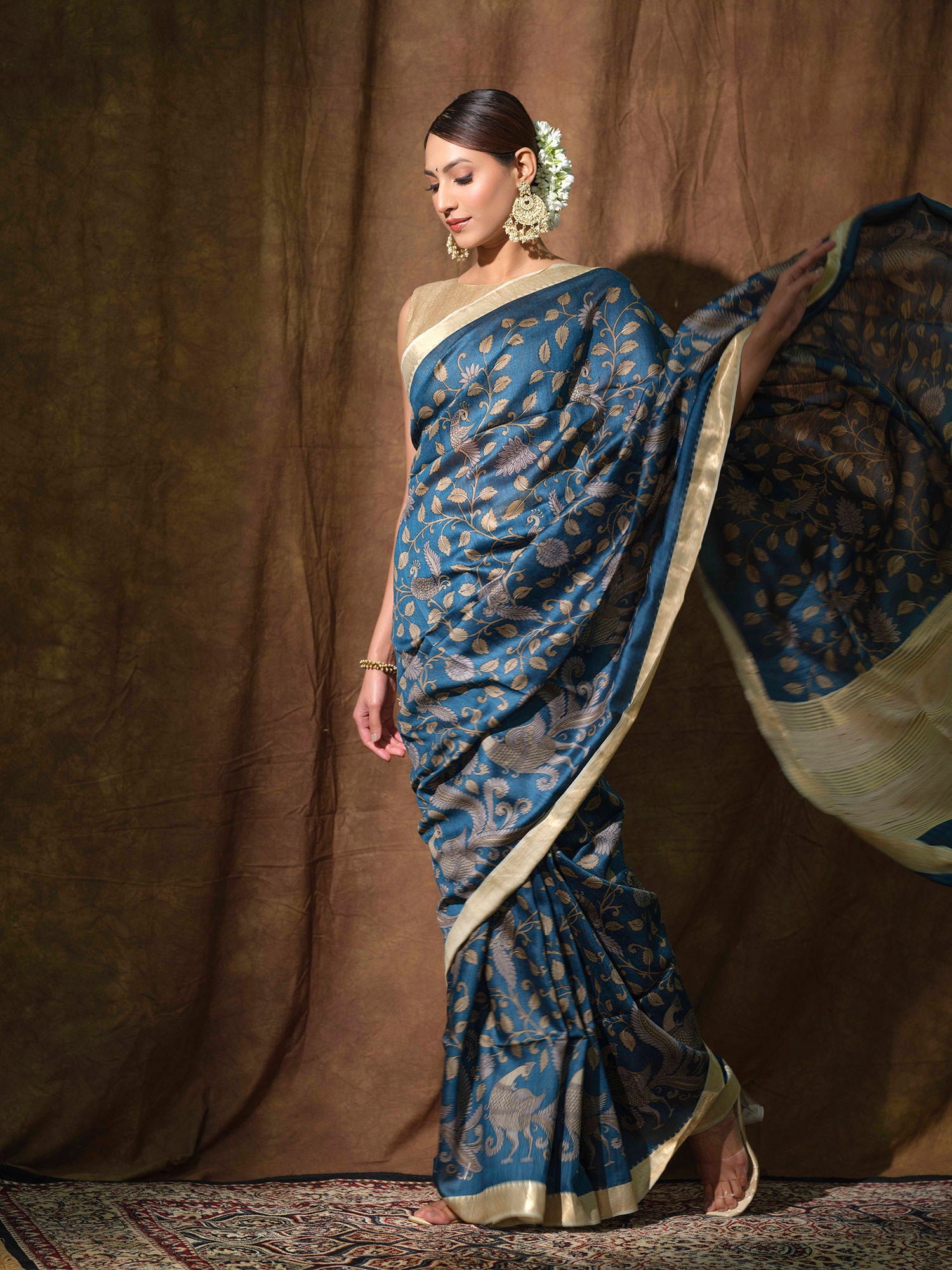 Pure Tussar silk Maheshwari saree with Kalamkari prints.