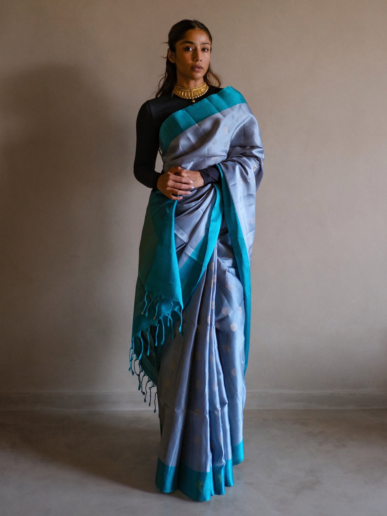 Santoshi - Powder Blue Pattu Silk Saree with Turquoise Border