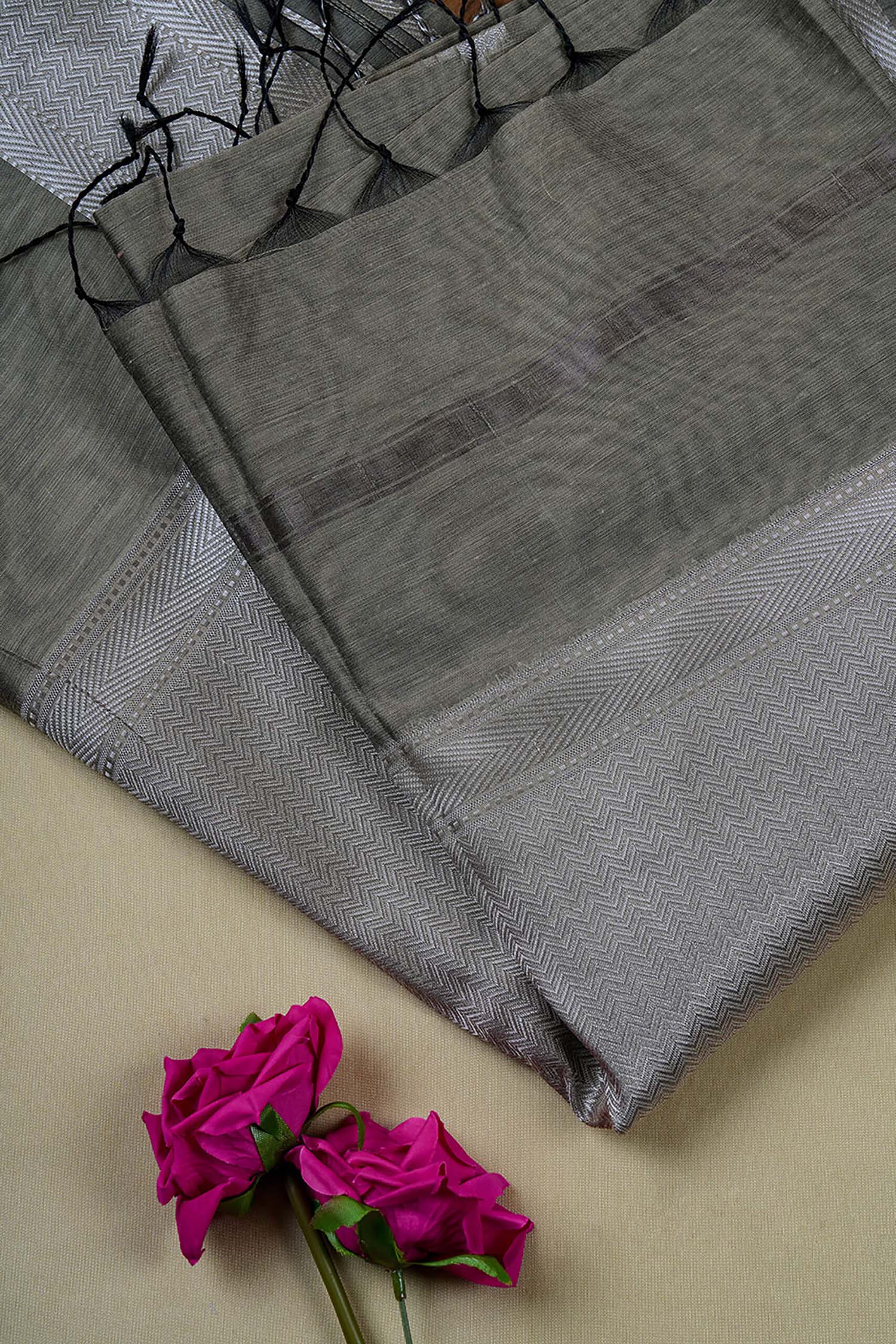 Sage green Maheshwari cotton silk saree with silver zari.