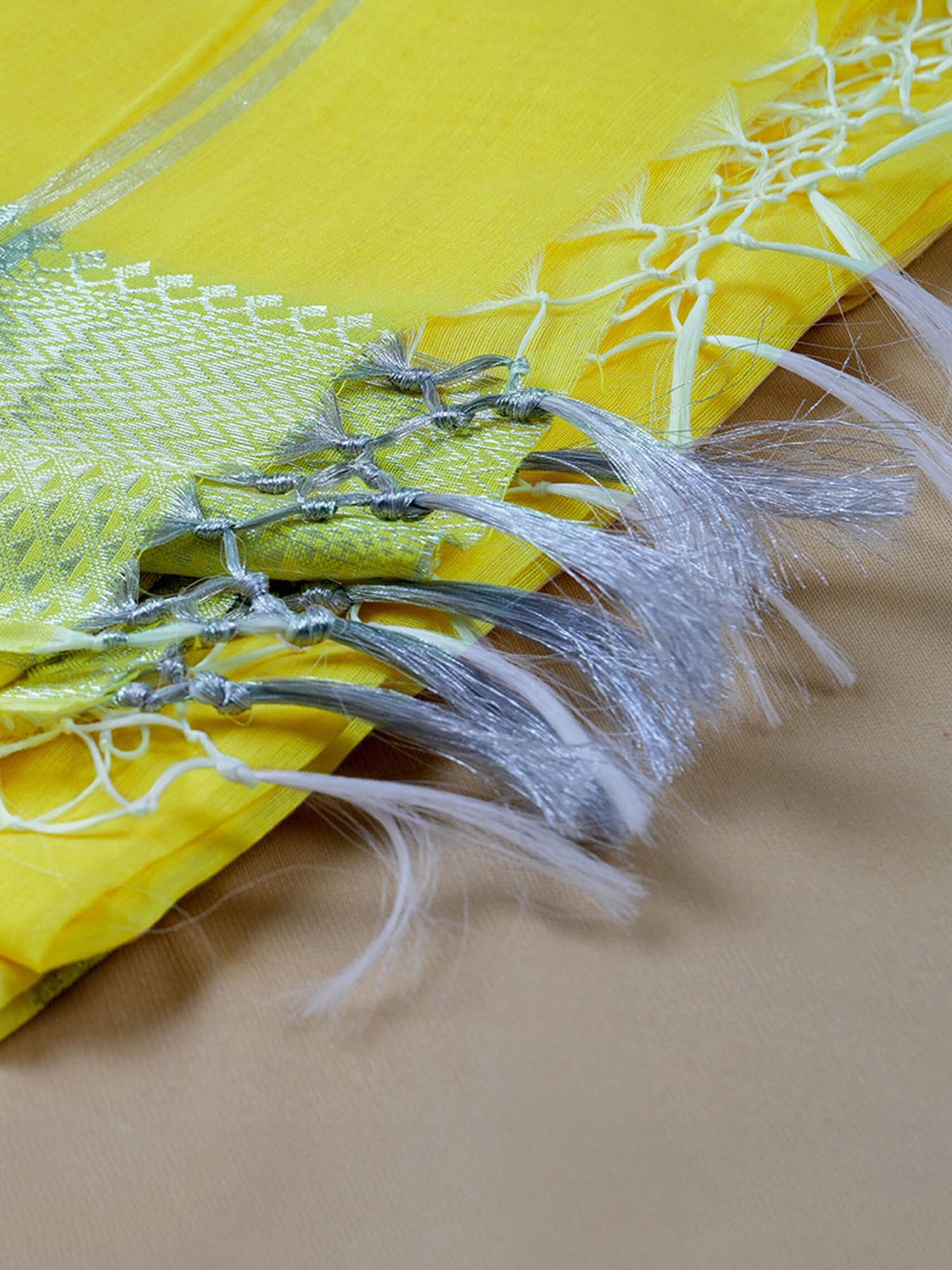 Lemon yellow Maheshwari cotton silk saree with zari.