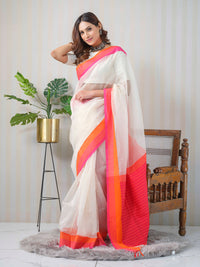 White and neon pink Maheshwari linen and silk saree.