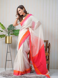 White and neon pink Maheshwari linen and silk saree.