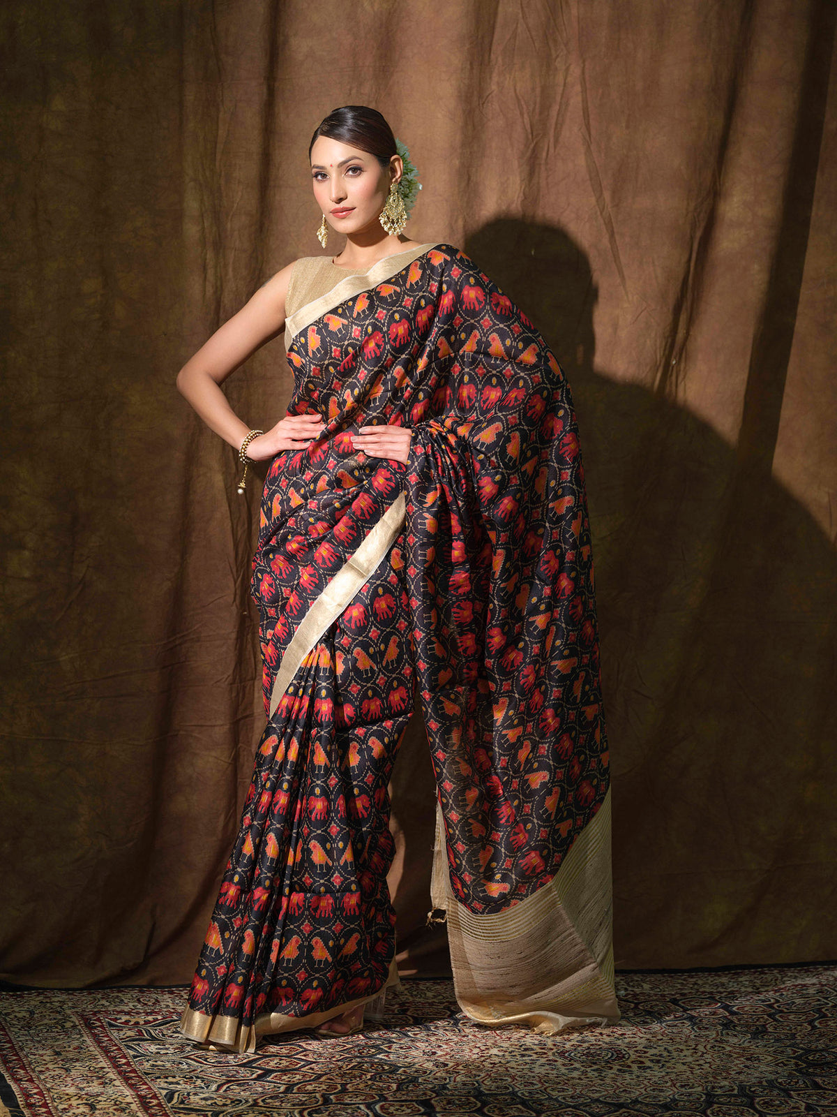 Pure Tussar Silk Black Maheshwari Sari with Patola print