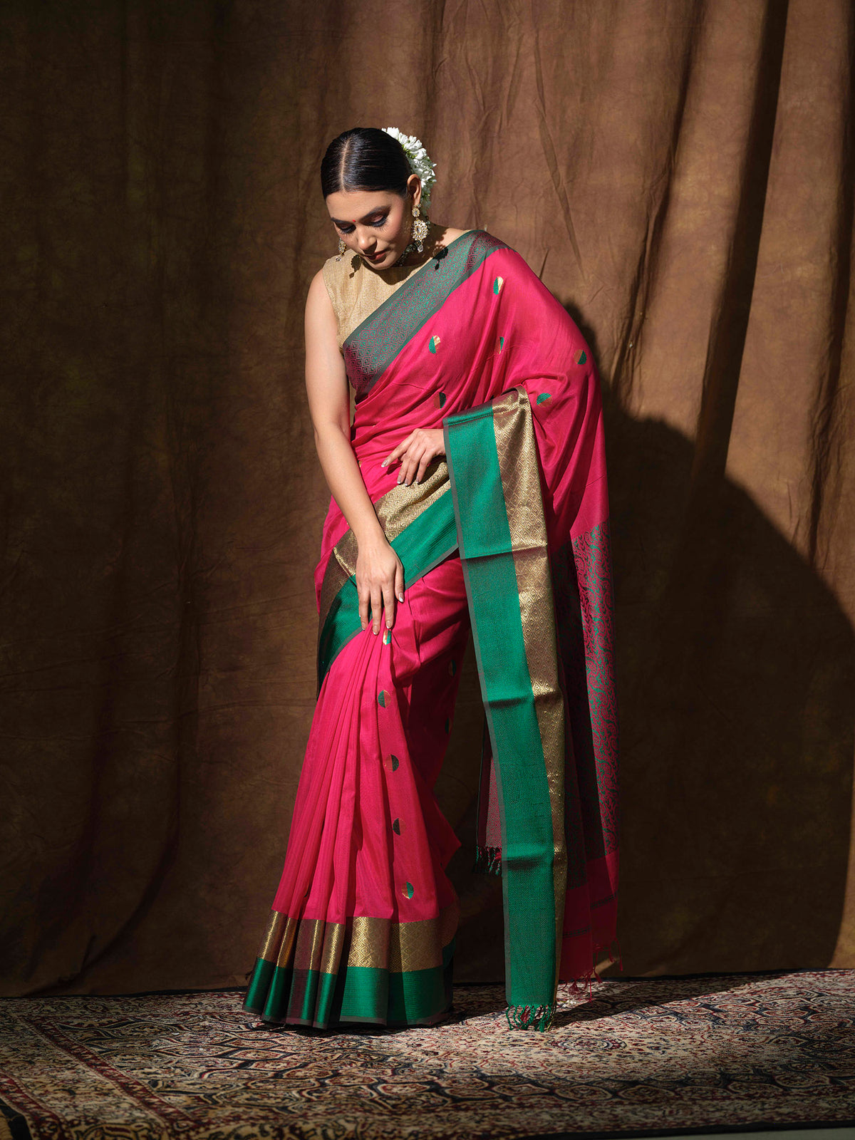 Pink and green Maheswari saree