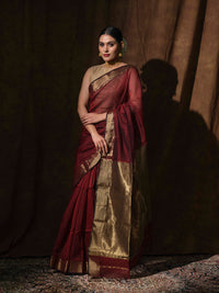 Maroon Maheshwari cotton silk saree with shimmering bronze accents.