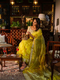 Abhaya - Bright Yellow Pattu Silk Saree with Silver Flower Buds