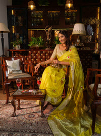 Abhaya - Bright Yellow Pattu Silk Saree with Silver Flower Buds