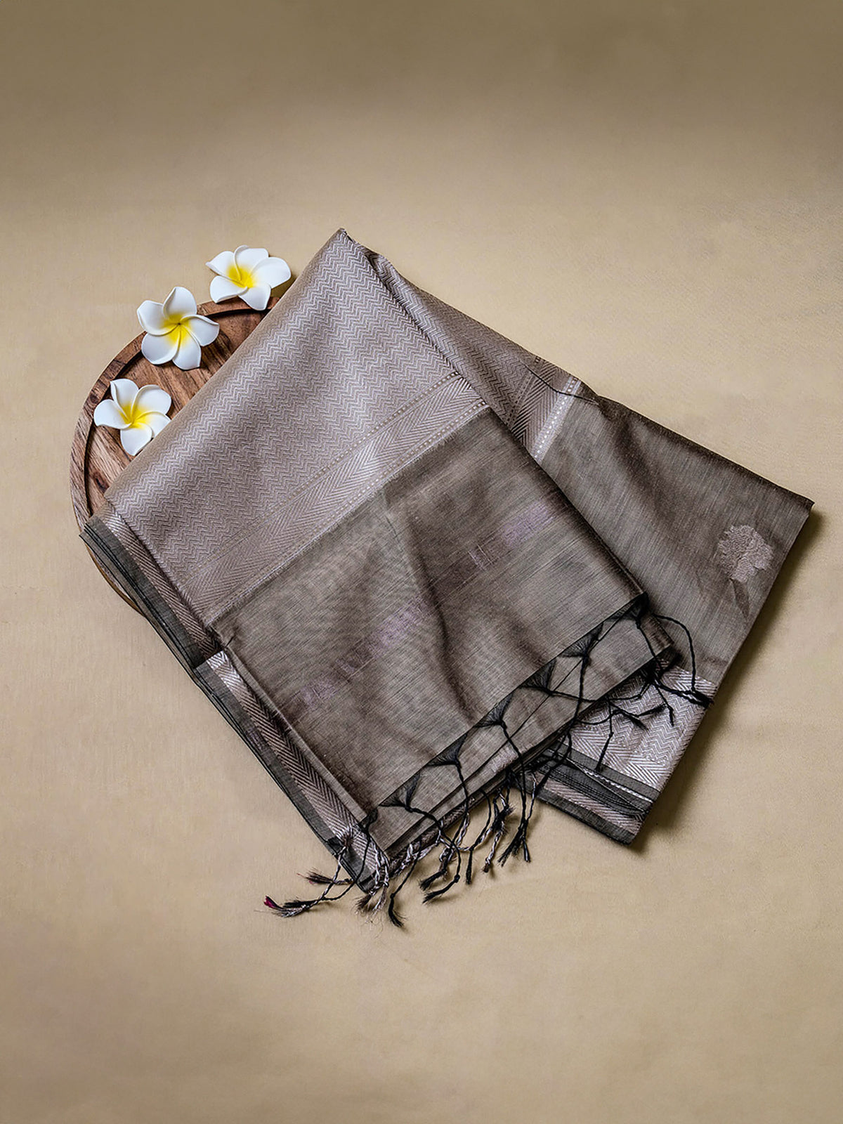 Sage green Maheshwari cotton silk saree with silver zari.