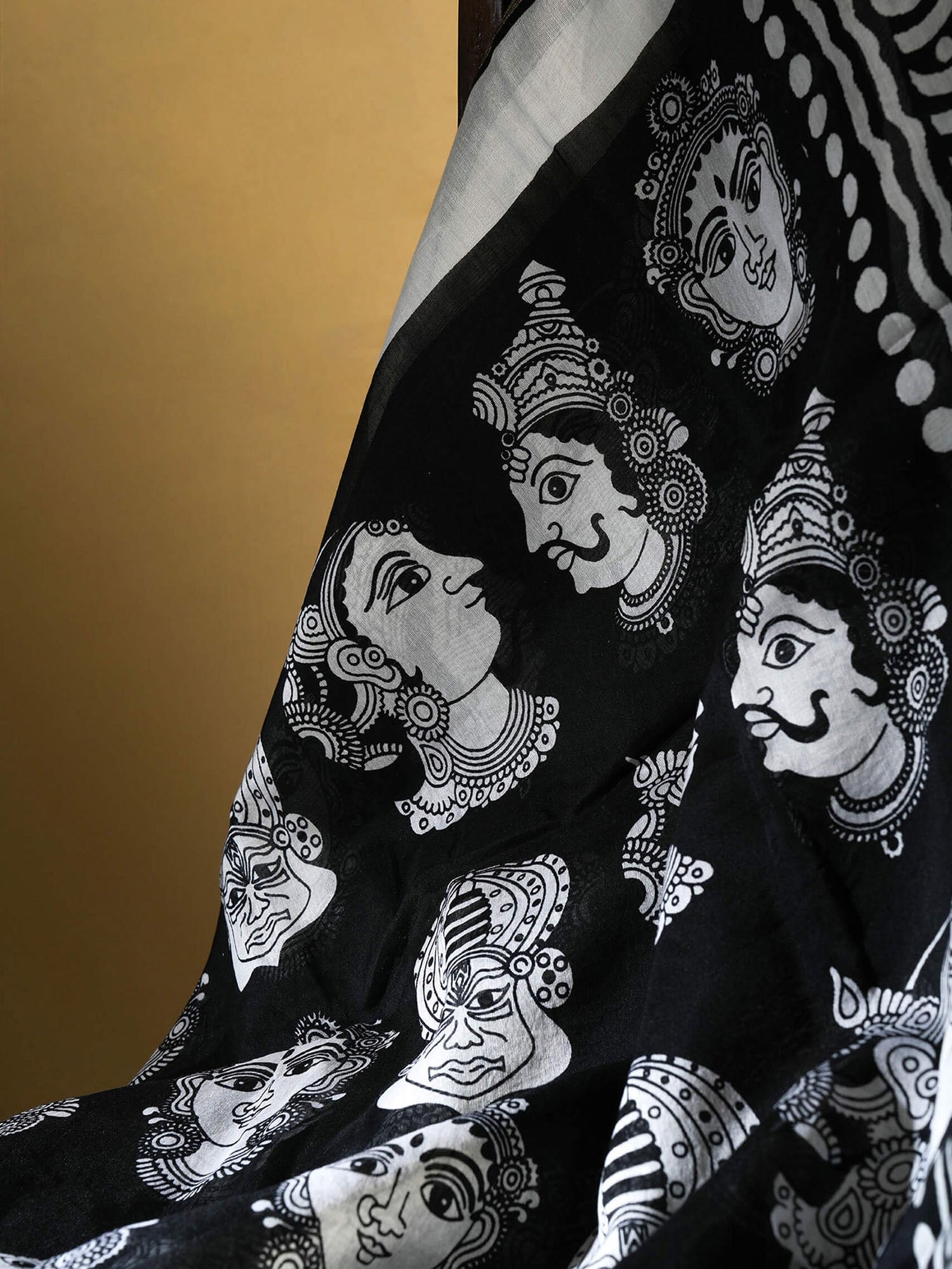 Maheshwari cotton silk saree with mask motif.