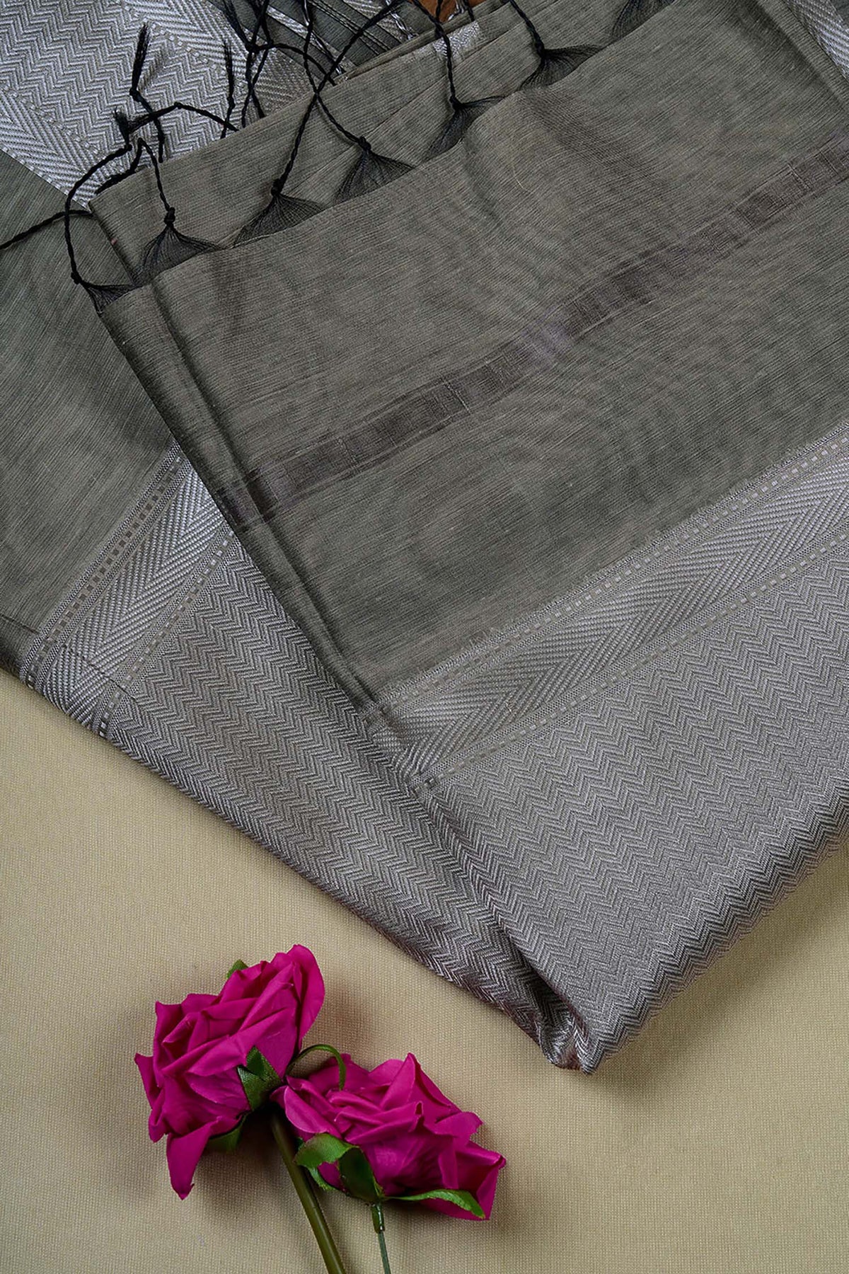 Sage green Maheshwari cotton silk saree with silver zari.