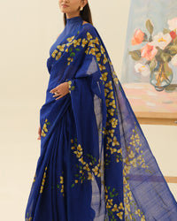Close-up of handpainted bougainvillaea floral artwork on the Bougainvillaea Wall saree