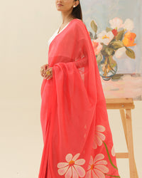 Close-up of handpainted champa floral artwork on the Champa Blush saree