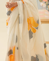 Handpainted pallu detail of the Golden Hibiscus saree by Mrida