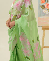 Close-up of handpainted floral artwork on the Morning Bloom saree