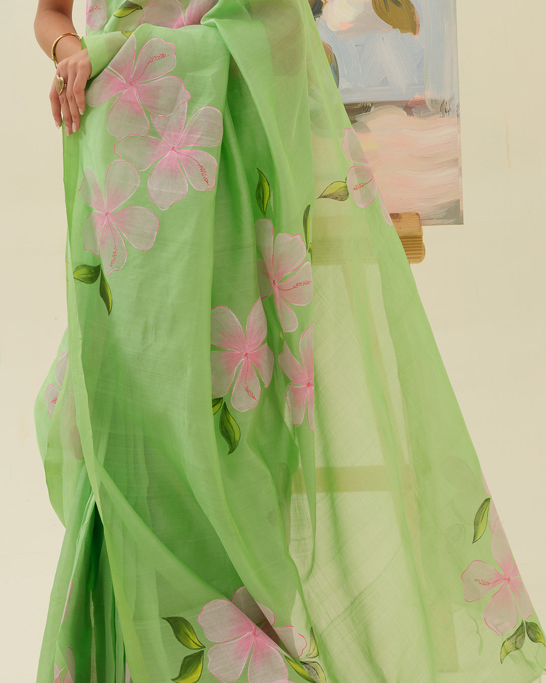 Artisan handpainted pink floral motifs on the Morning Bloom saree by Mrida