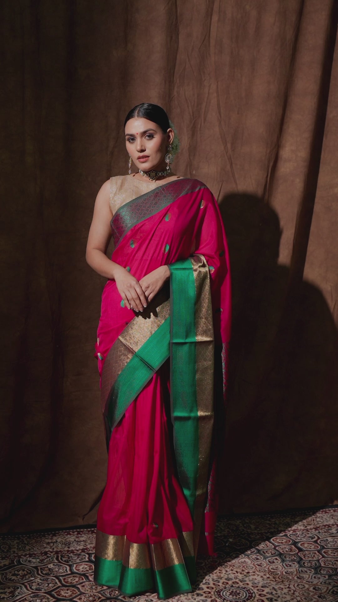 Pink and green Maheswari saree