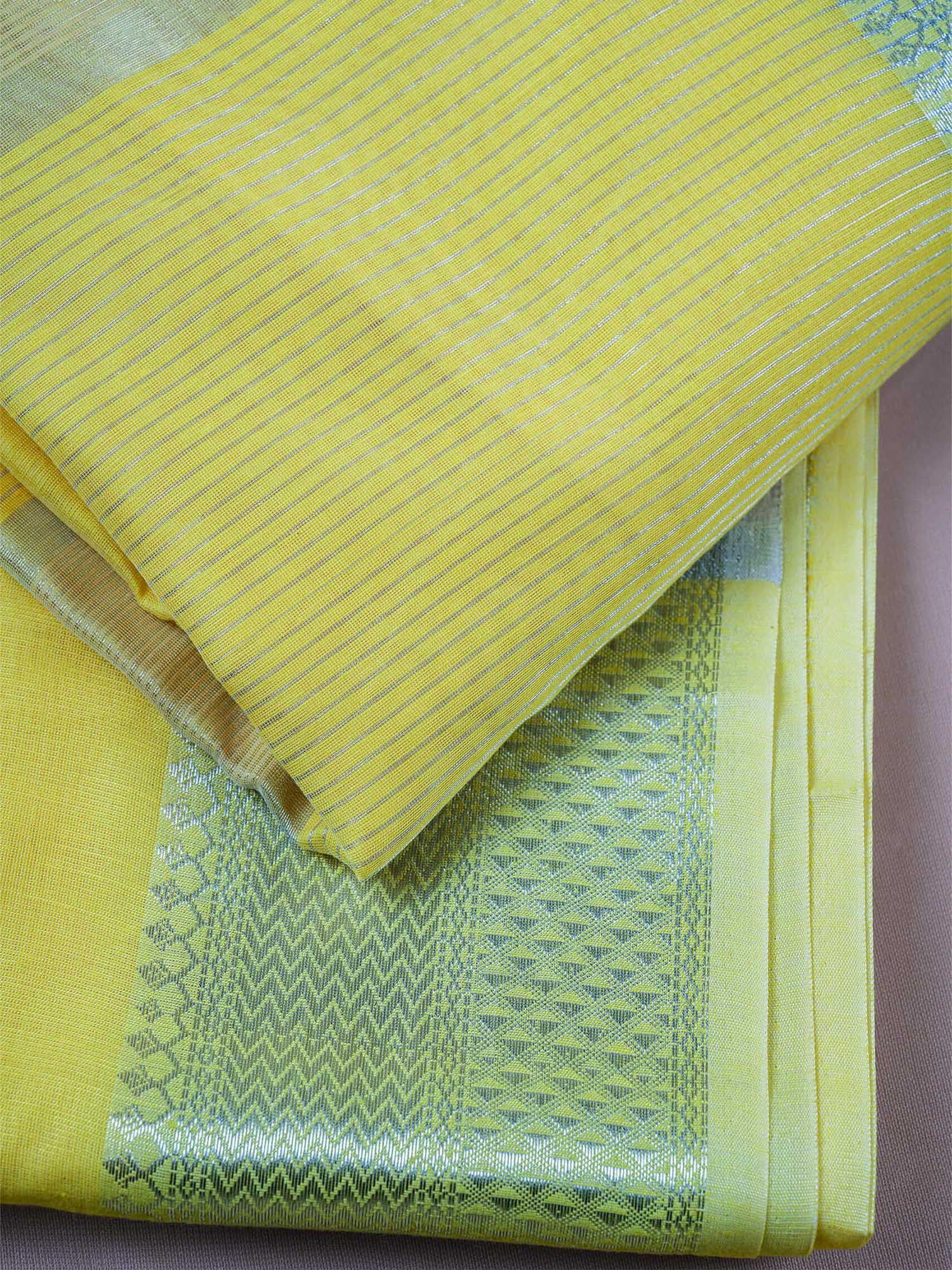 Lemon yellow Maheshwari cotton silk saree with zari.